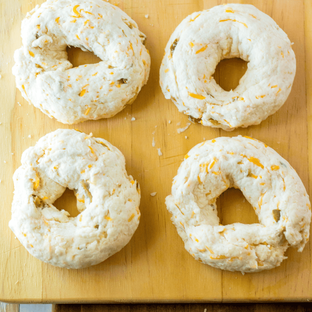 Adding chopped jalapenos to the dough for a spicy kick