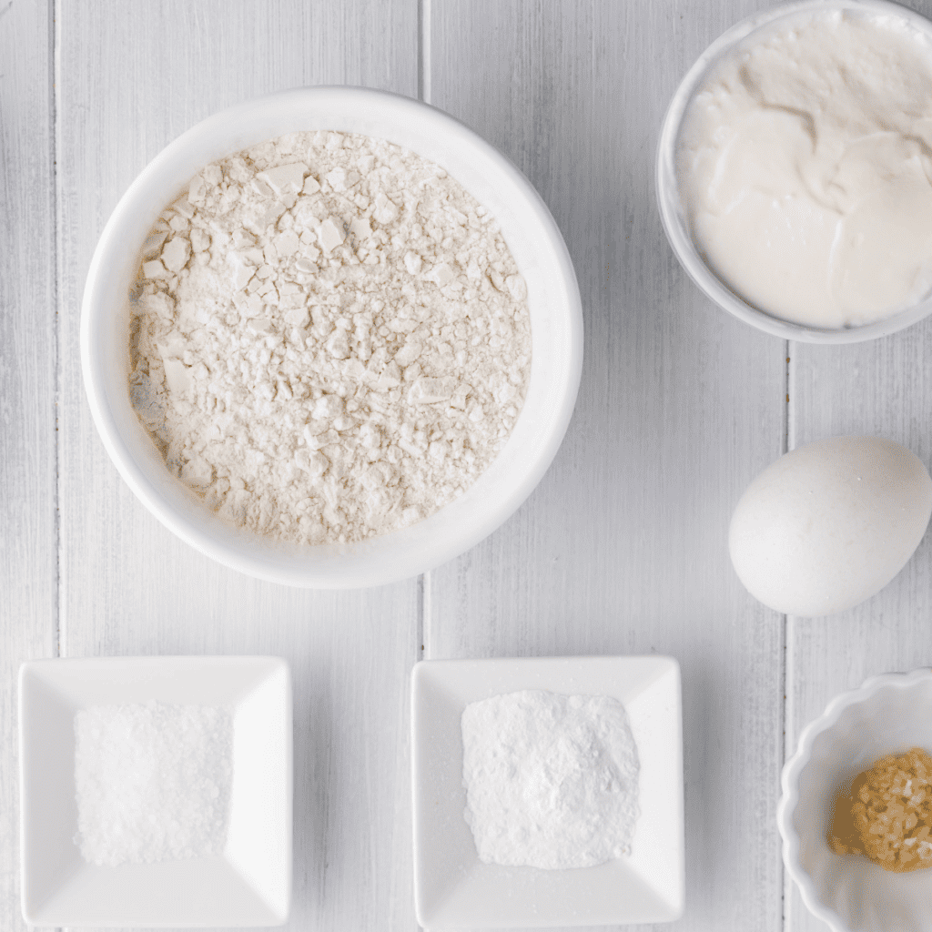 Ingredients for Air Fryer 2-Ingredient Bagel Bites: Greek yogurt, self-rising flour, and everything seasoning