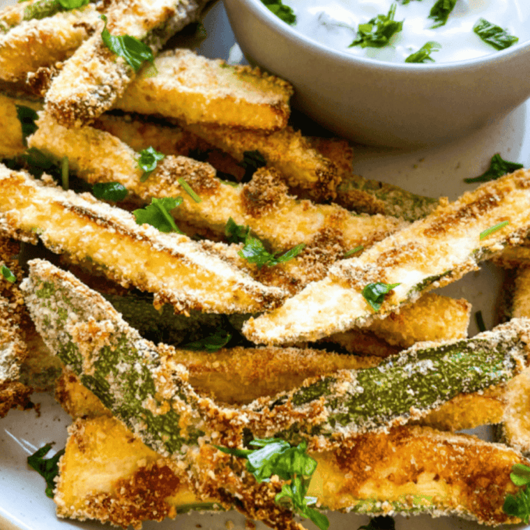 Close-up of Copycat Carrabba’s Zucchini served in a dish, showing tender, seasoned zucchini slices.