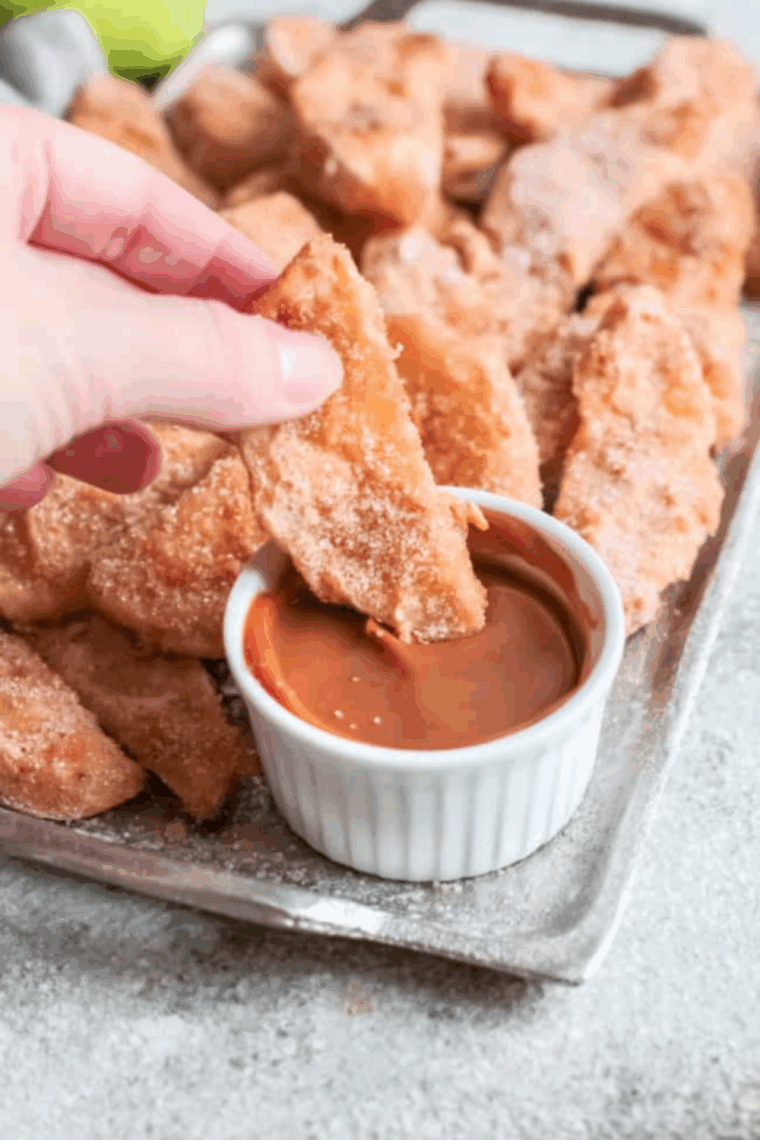 Crispy, lightly spiced Legoland-style apple fries served on a plate, ready to enjoy.