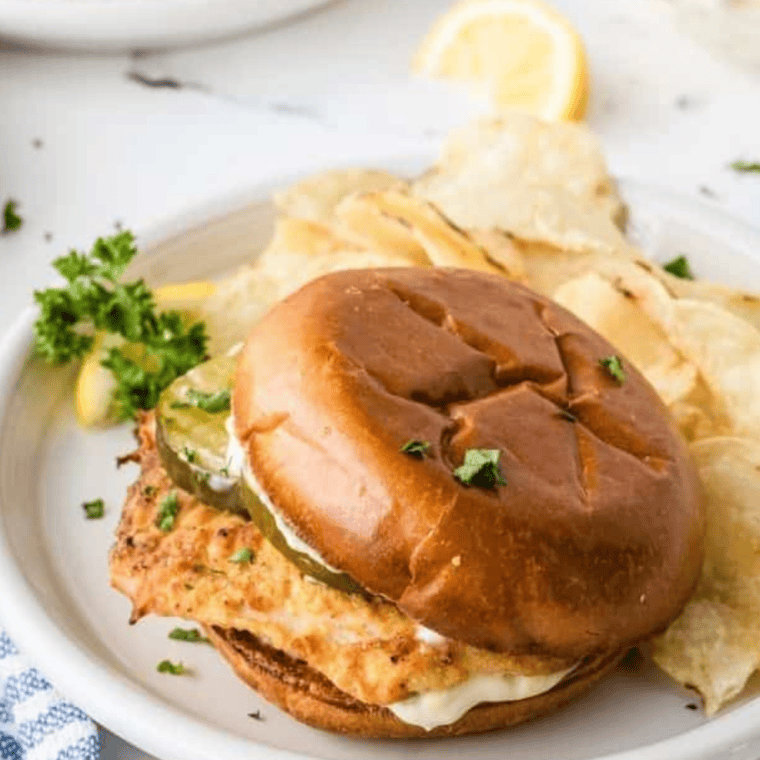 Popeyes Fish Sandwich Copycat with crispy fish fillets, soft bun, and tangy sauce.
