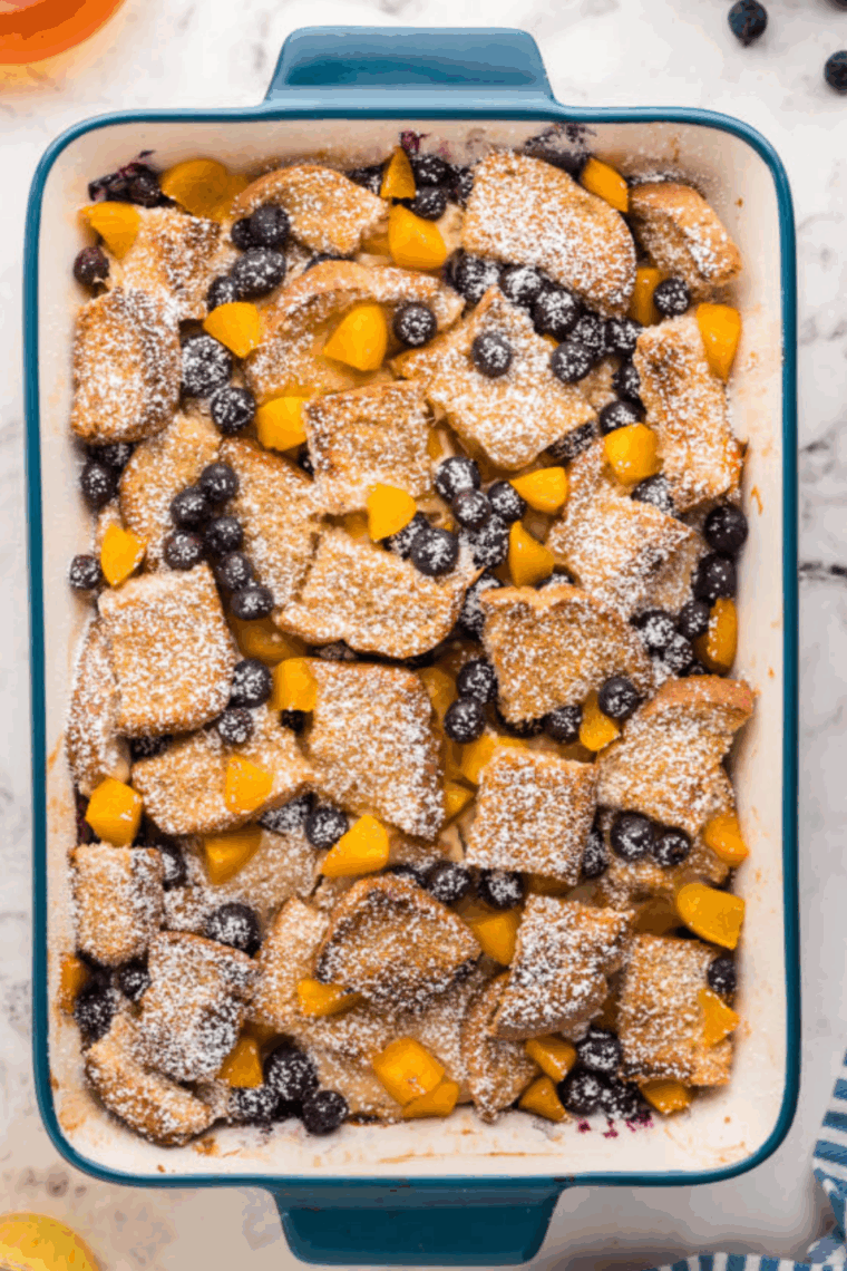 Air fryer French toast casserole with a crisp buttery top and cinnamon swirls