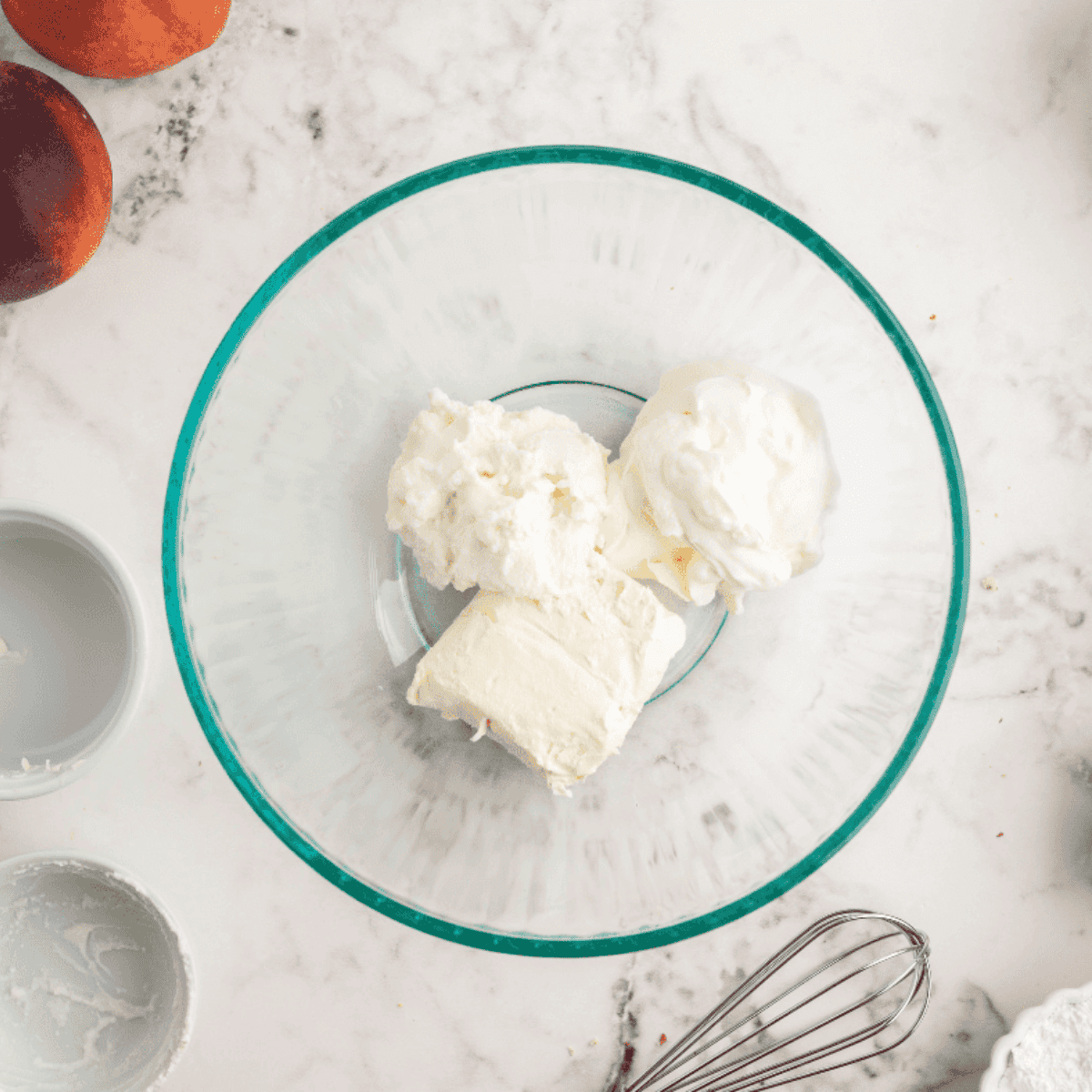 Whisking the egg and milk custard for French toast casserole in a mixing bowl