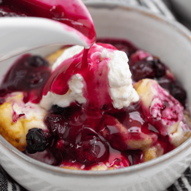 Air fryer blueberry French toast casserole with golden baked bread and fresh blueberries on top