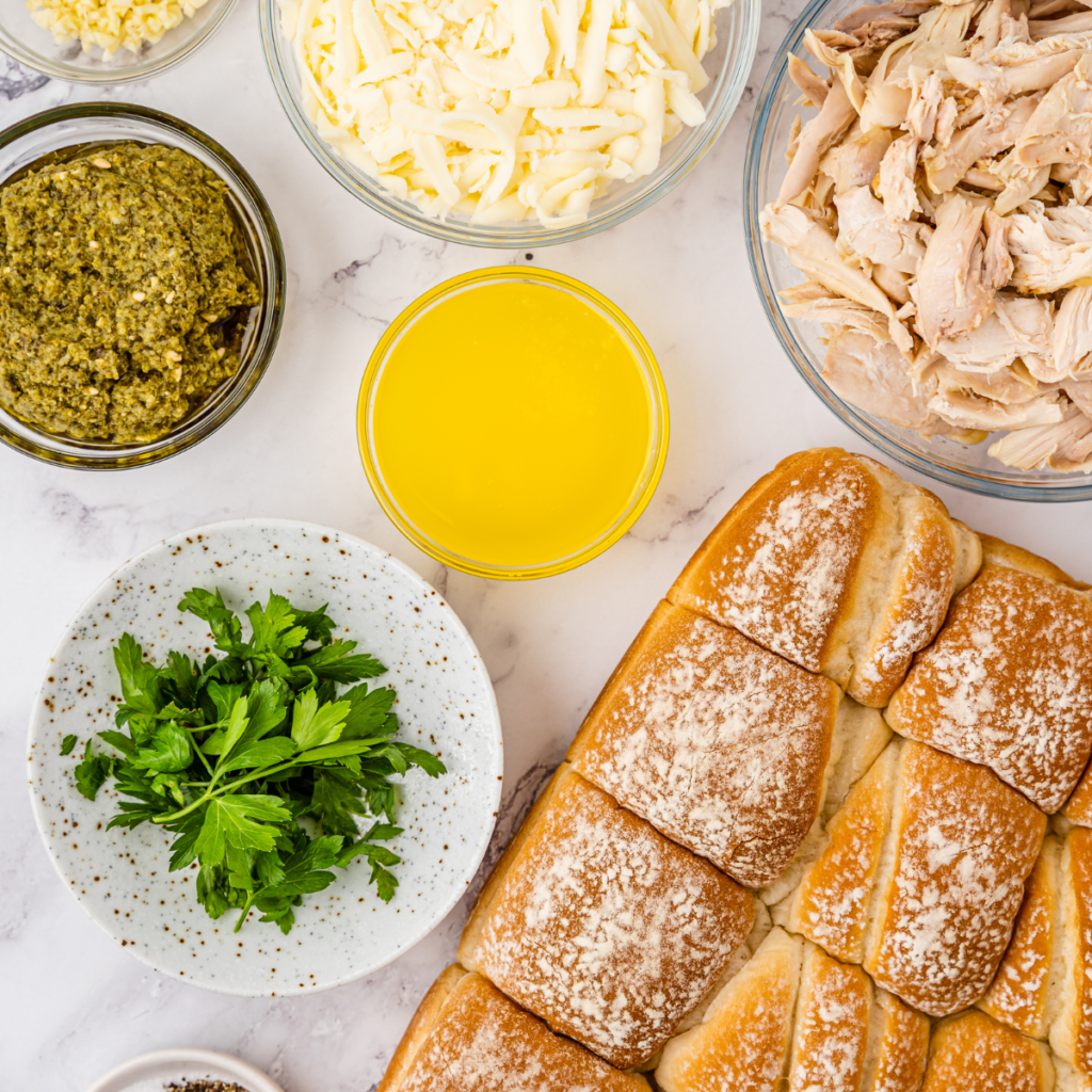 Ingredients Needed For Air Fryer Chicken Pesto Sliders on kitchen table.