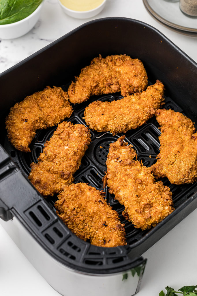 Golden, crispy Zaxby’s chicken fingers served with coleslaw and dipping sauce.