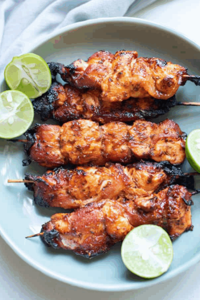 Golden brown, crispy Air Fryer Chicken Thigh Bites served with dipping sauce, tender and juicy on the inside.