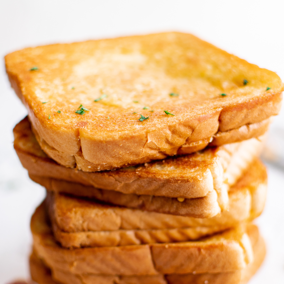 Golden, crispy Air Fryer Jalapeño Popper Grilled Cheese with melted cheese and jalapeños.