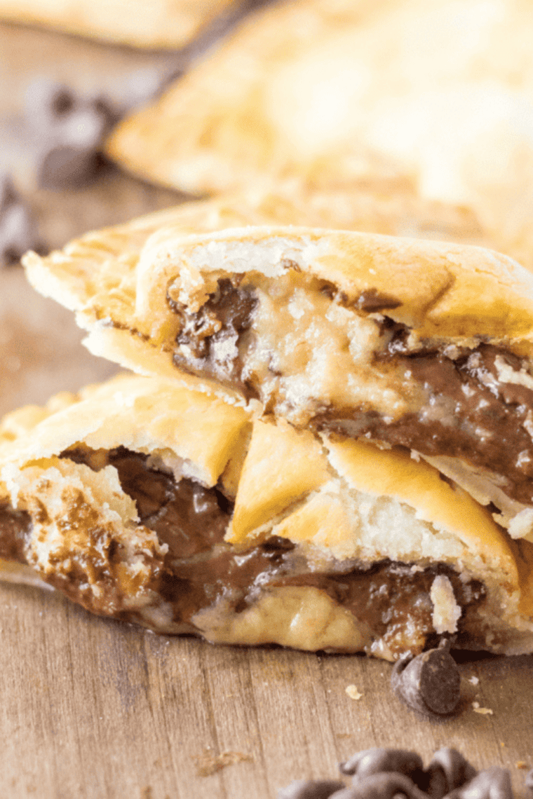 Golden mini chocolate chip cookie pies with melty chocolate chips cooked in the air fryer