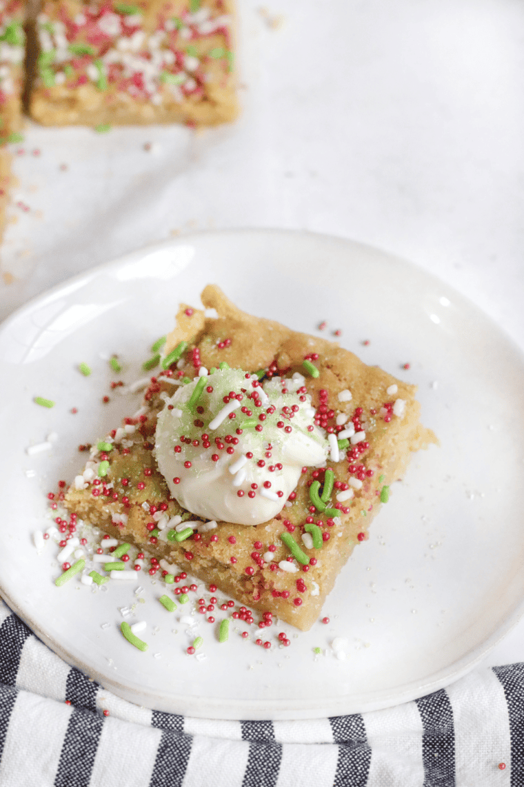 Golden, soft sugar cookie bars fresh from the air fryer, cut into squares and ready to enjoy.