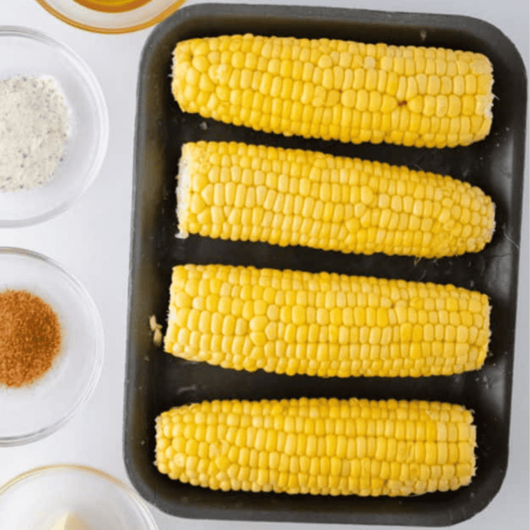 Ingredients needed for Air Fryer Cajun Corn (Winstop) on kitchen table.