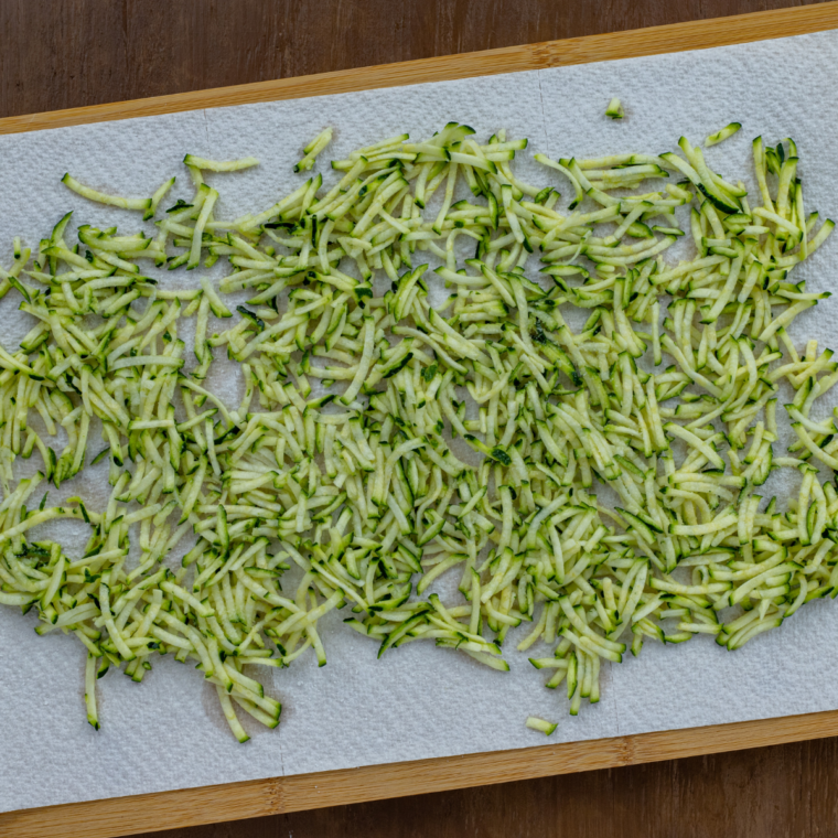 Grated zucchini squeezed dry in towel before mixing burger patty ingredients