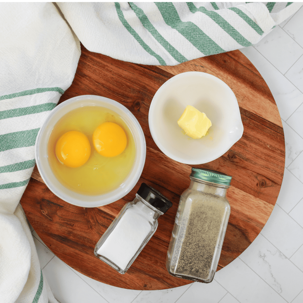 Eggs, heavy cream, butter, salt, and pepper for Blackstone scrambled eggs