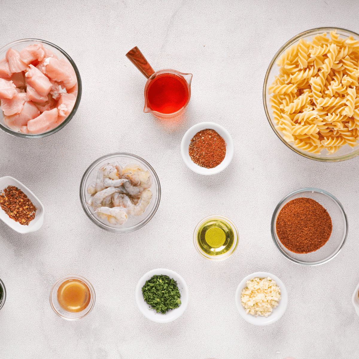 Cheesecake Factory Copycat New Orleans Cajun Shrimp Recipe ingredients on kitchen table.