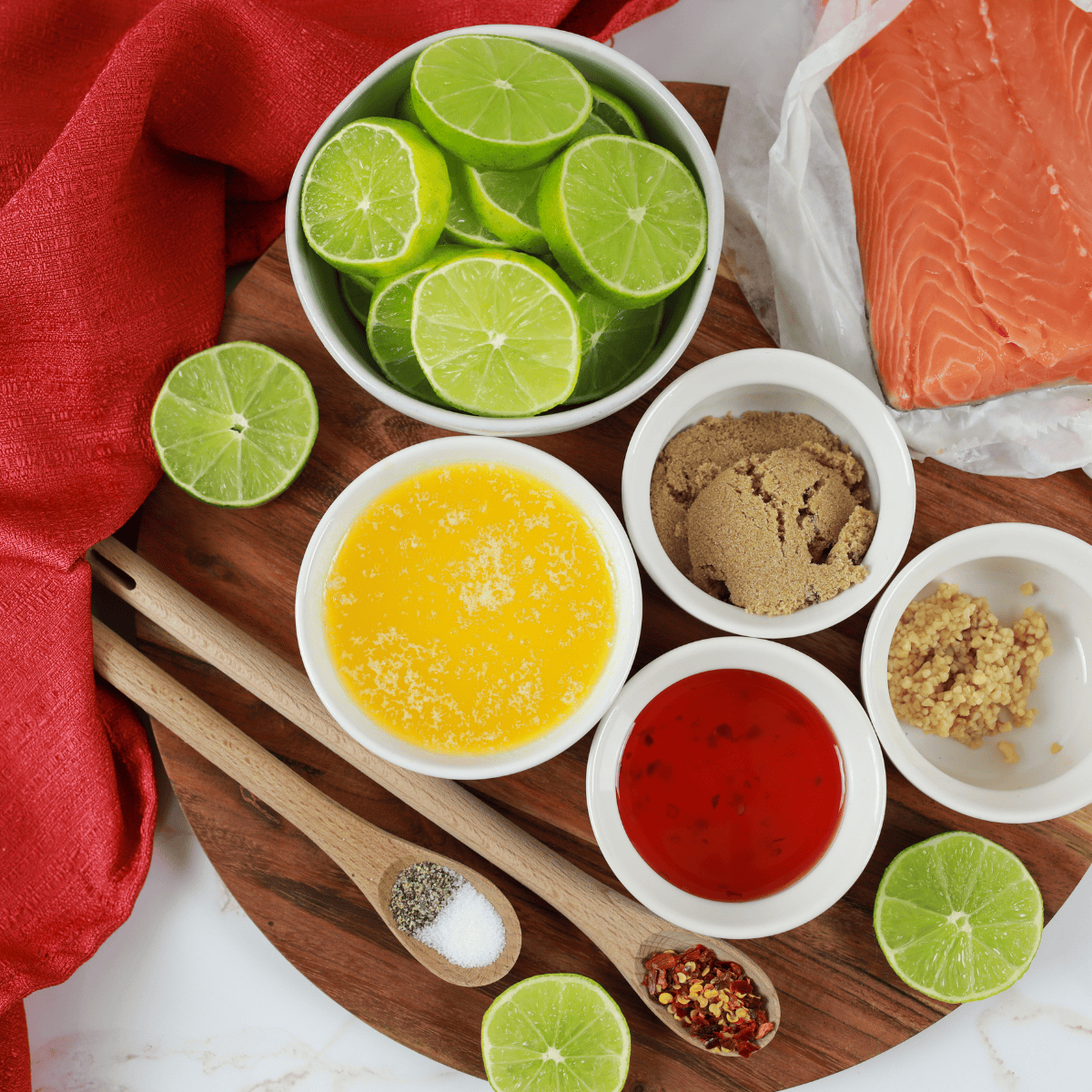 Ingredients needed for Copycat Texas Roadhouse Salmon Recipe on kitchen table.