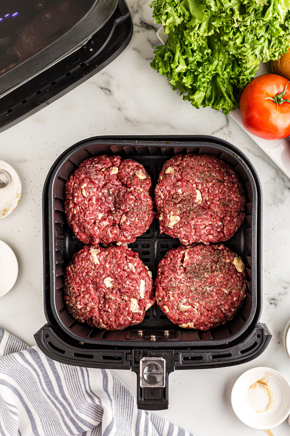 Place the formed burger patties into the air fryer basket.