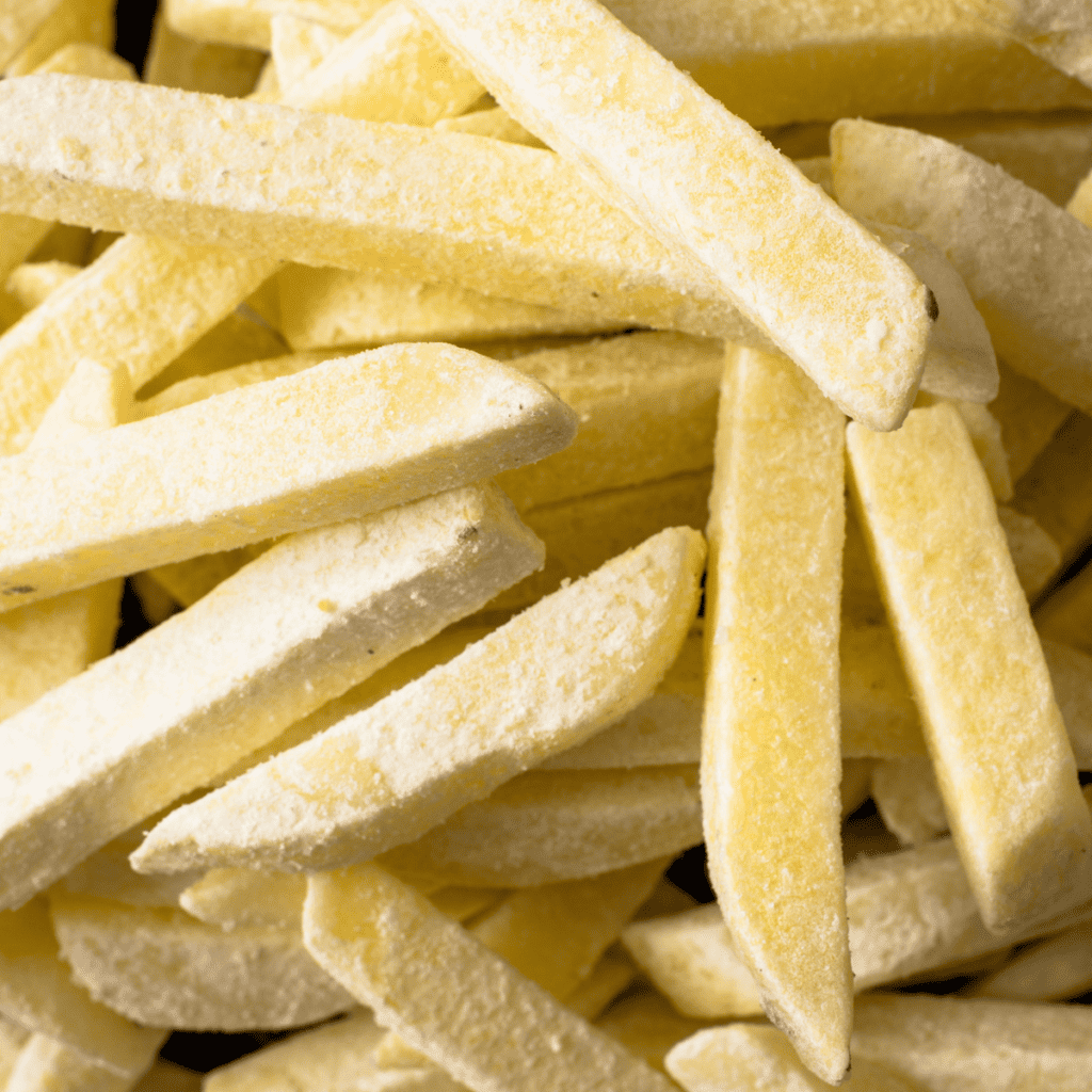 Ingredients needed for Air Fryer Ore Ida Golden Fries on kitchen table.