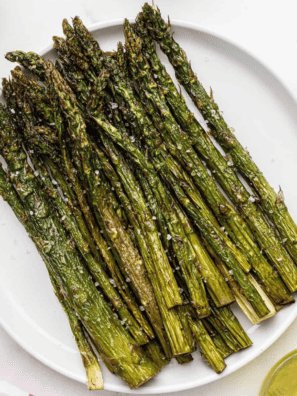 Ninja Foodi Grill Asparagus -- If you love the flavor of grilled asparagus, you will love this easy side dish cooked on your Ninja Foodi Grill. It's amazing, and with a few simple seasonings, you can make this delicious recipe in minutes!