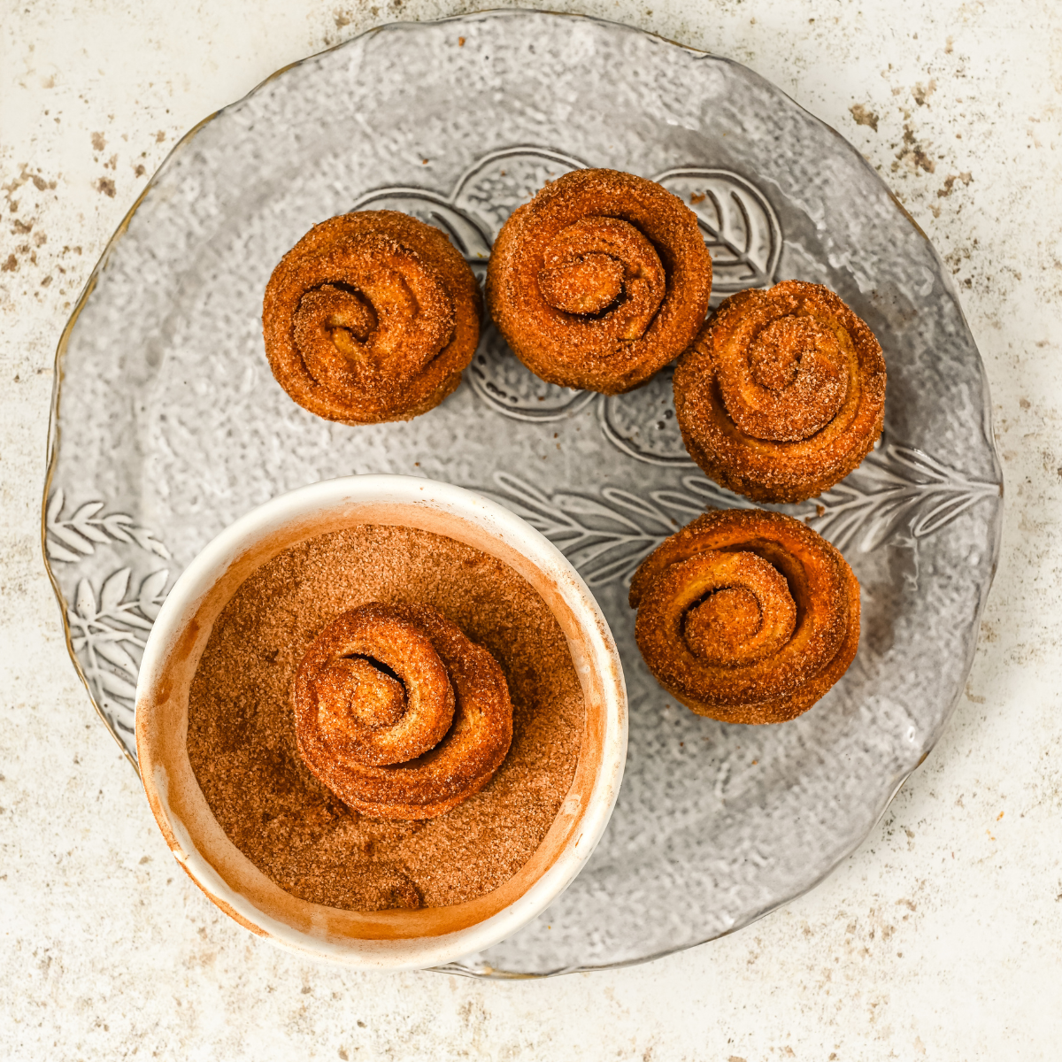 Golden brown Air Fryer Cruffins: Freshly baked Cruffins with a flaky exterior, resting on a cooling rack.