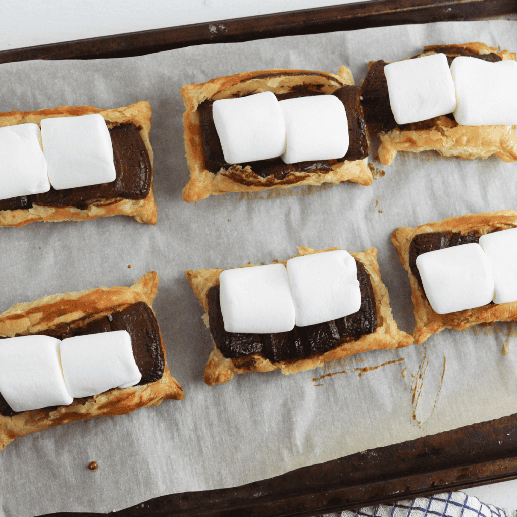 Cooked Air Fryer Puff Pastry S’mores Bites on parchment paper.