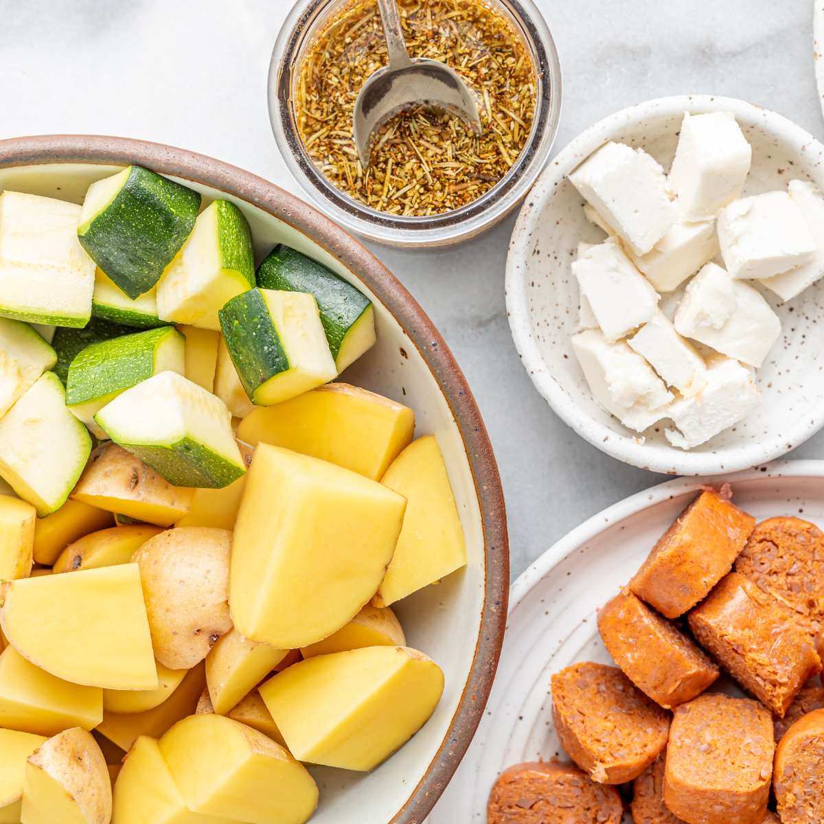 Ingredients for Air Fryer Sausage and Veggies: "Ingredients laid out for making air fryer sausage and veggies.