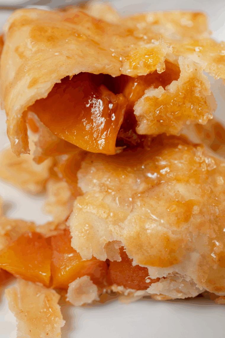 Easy air fryer peach pie with golden flaky crust and warm peach filling.
