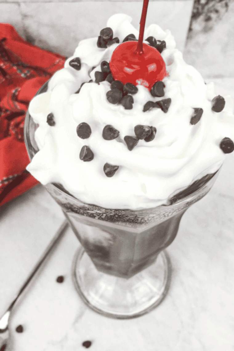 Ninja Creami Dr. Pepper cream soda frozen dessert in pint container, creamy and smooth texture