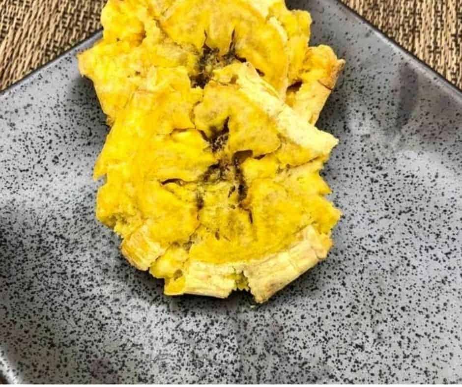 overhead closeup: air fryer tostones on a gray plate