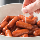 Air Fryer Cocktail Franks are bite-size savory treats that can be enjoyed as party appetizers or snacks alongside your favorite sauces, condiments, and other assortments of delicious finger foods! Cooking the cocktail franks in the air fryer offers the perfect environment for these simple snacks to turn a crispy golden brown while remaining juicy, soft, and creamy inside. As soon as you have one, you’ll be reaching for more!