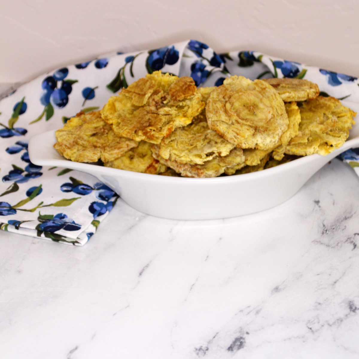 Are you looking for a delicious and easy way to cook one of your favorite side dishes? Then why not try using an air fryer to make frozen tostones - they are so simple and come out perfectly crunchy every time! Not only is this method quick, but it also requires minimal mess and fewer calories. In this blog post, we will teach you step by step how to cook deliciously crispy frozen tostones in just minutes with no added fat or oil. Let’s get started!