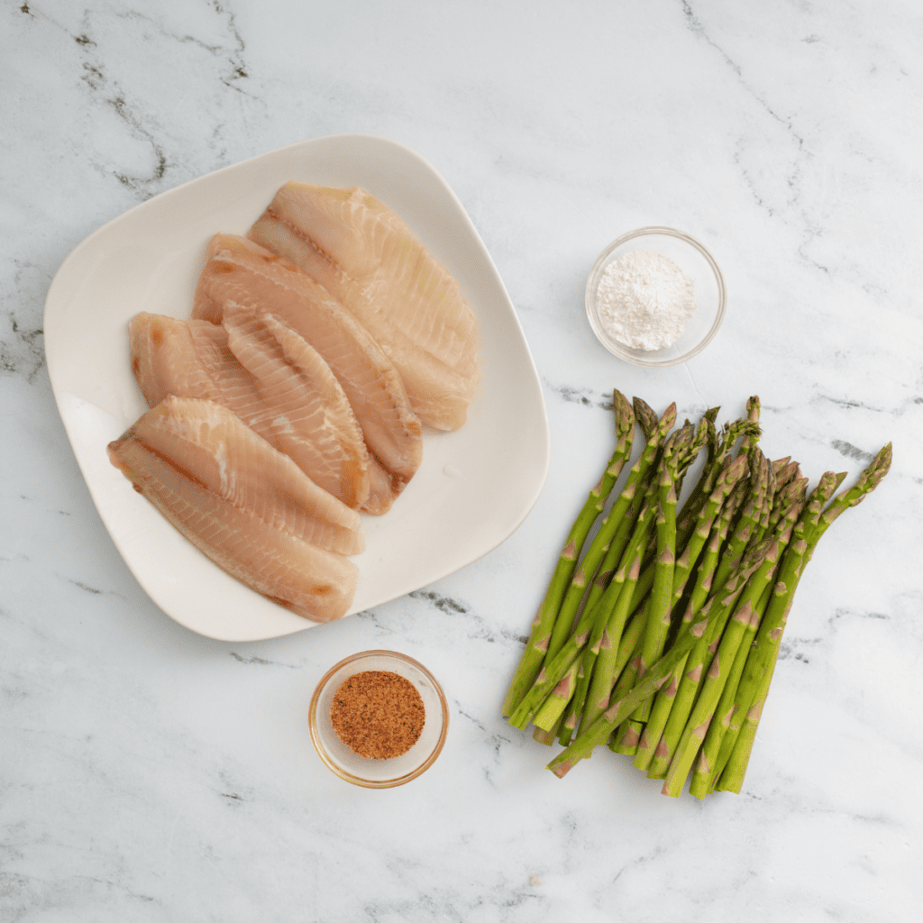 Ingredients for Blackstone catfish: fillets, oil, butter, and seasoning