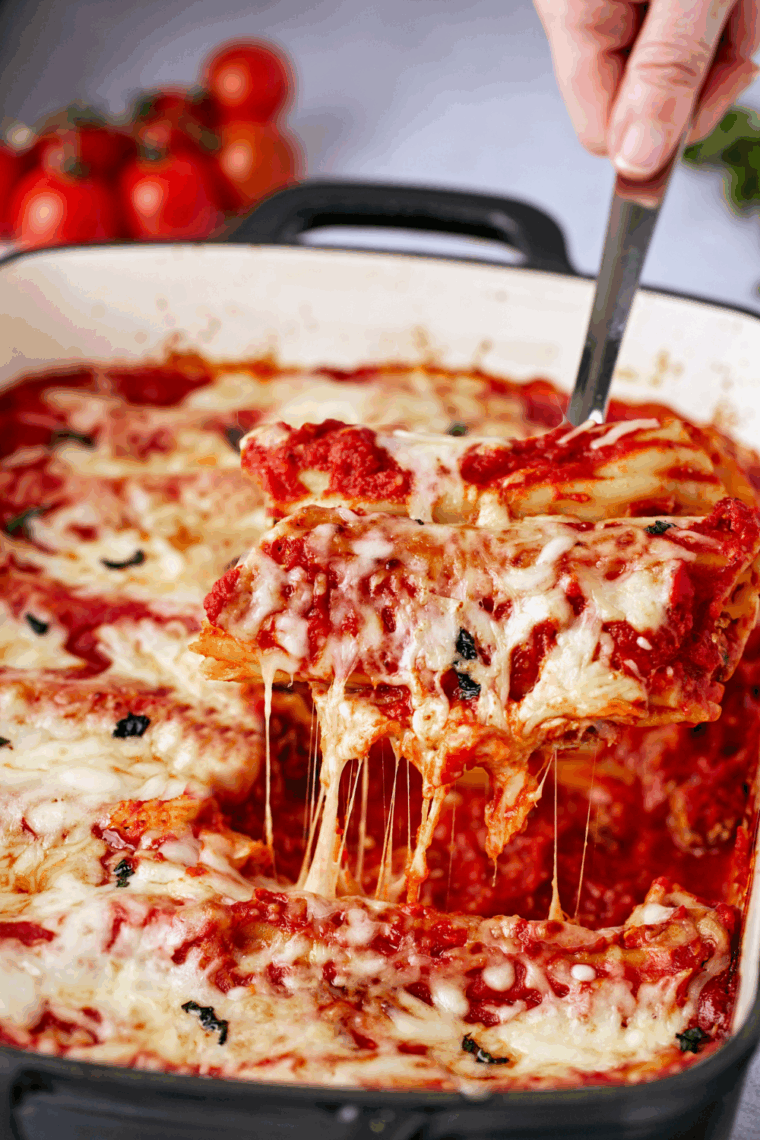 Golden, cheesy manicotti cooked in the air fryer, topped with marinara sauce