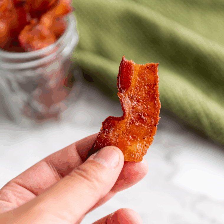 Caramelized, crispy Million Dollar Bacon slices coated in brown sugar and butter.