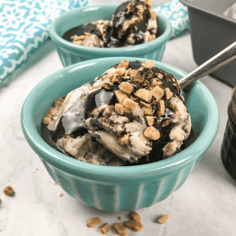 A bowl of Ninja Creami Chocolate Toffee Ice Cream, topped with crunchy toffee bits and swirled with creamy chocolate goodness.