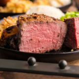 Cooking Blackstone filet mignon is the easiest way to get a steakhouse-quality steak at home — a deep, caramelized sear on the outside and a buttery, tender center, all in under 15 minutes of cook time. The flat-top griddle gives the entire surface of the steak full contact with the heat, so you get an even crust that's tough to match on a grill grate.