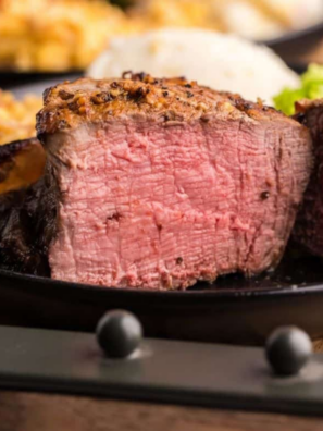 Cooking Blackstone filet mignon is the easiest way to get a steakhouse-quality steak at home — a deep, caramelized sear on the outside and a buttery, tender center, all in under 15 minutes of cook time. The flat-top griddle gives the entire surface of the steak full contact with the heat, so you get an even crust that's tough to match on a grill grate.