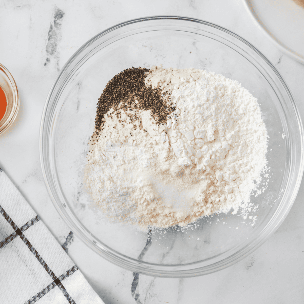 Add the seasonings to the flour mixture.