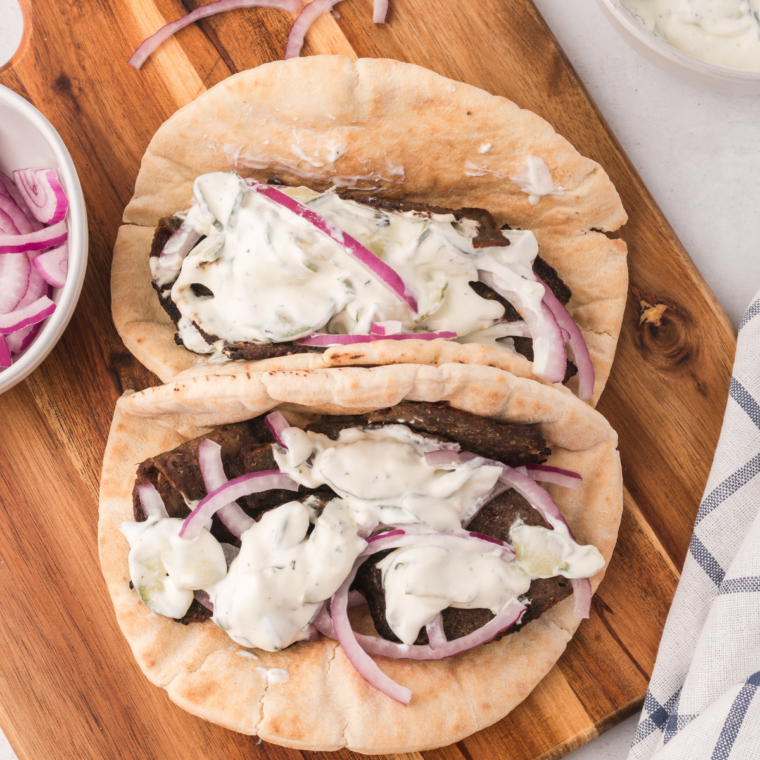 Air fried Trader Joe's gyro slices in warm pita with tzatziki, tomato, and red onion