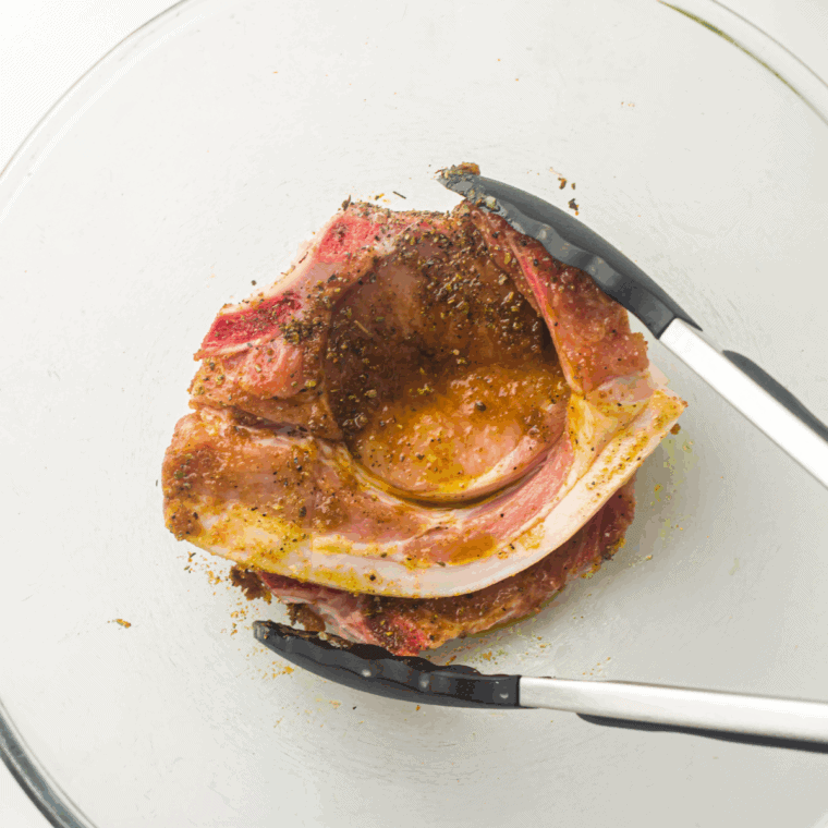 Season the pork chops.