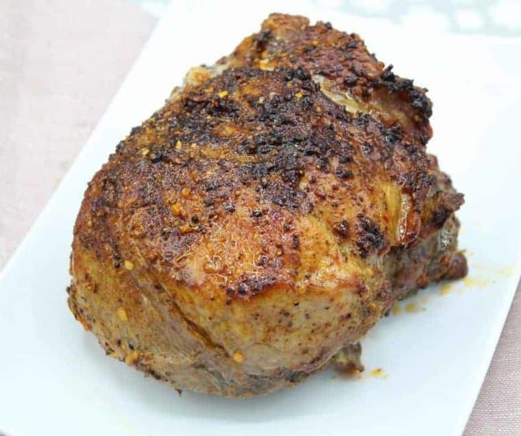 Close up of pork roast in air fryer.