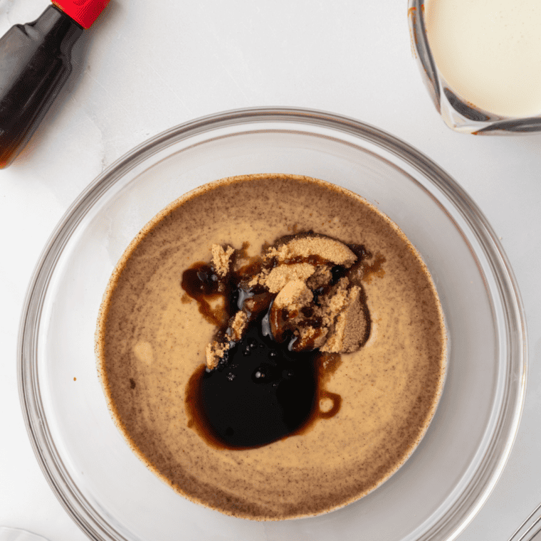 Whisking milk, vanilla pudding mix and gingerbread spices together in a measuring cup