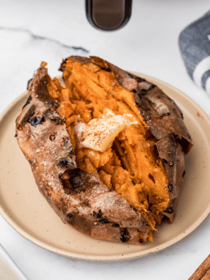 Outback Steakhouse sweet potato recipe served split open with honey butter melting into the flesh