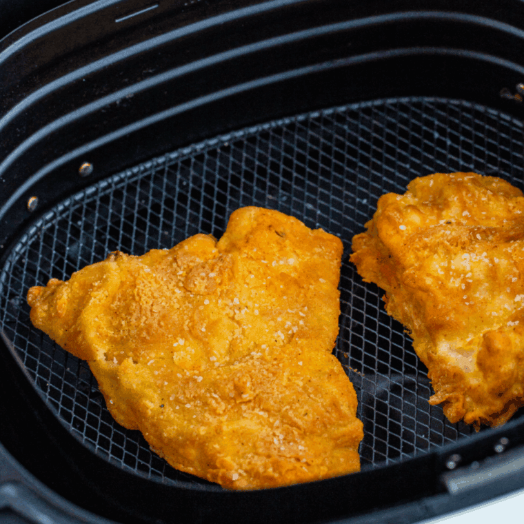 Place leftover fish and chips in the air fryer basket.