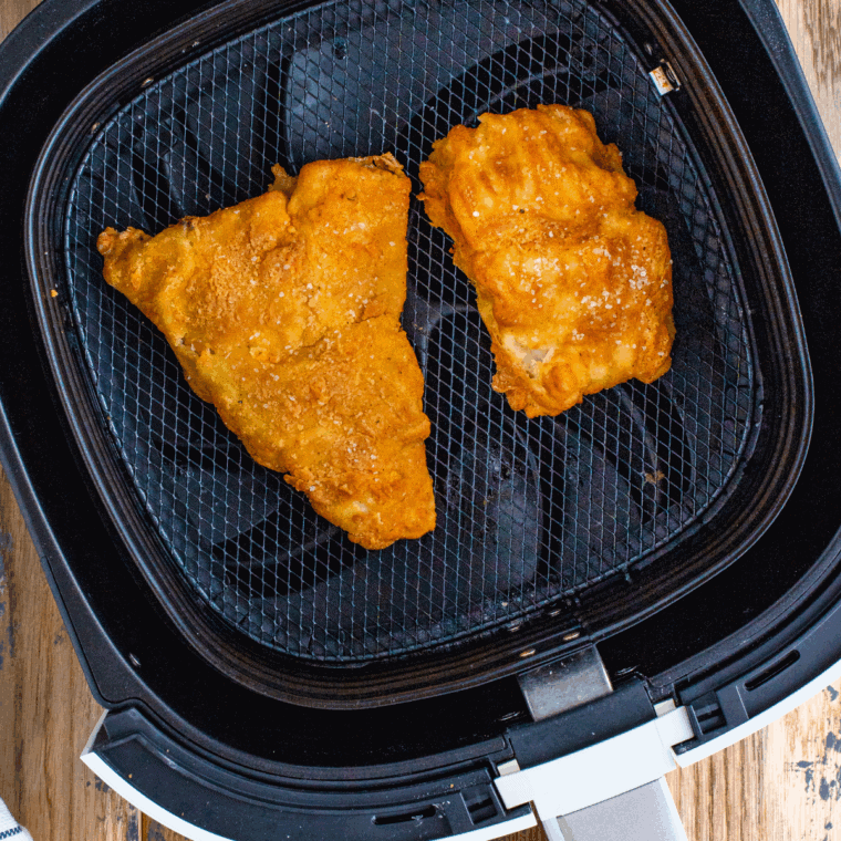 Ingredients needed for Reheat Fish And Chips In Air Fryer on kitchen table.