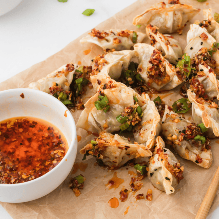 Golden Trader Joe's Air Fryer Chicken Cilantro Mini Wontons served with soy dipping sauce