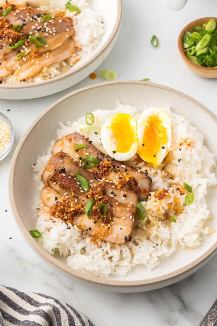 Serving Suggestion for Pork Belly Rice Bowl - A well-styled bowl of pork belly rice served with chopsticks, showcasing the dish's vibrant colors and textures.