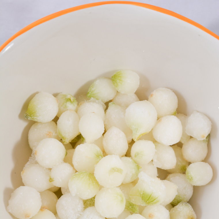 Olive oil and spices whisked together in a bowl for blooming onion bites