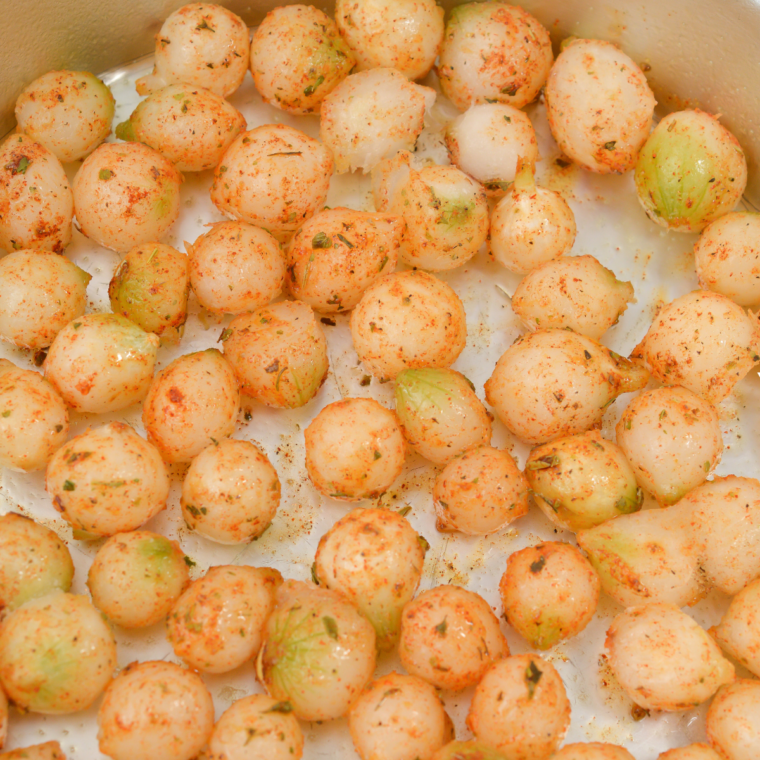Frozen pearl onions tossed in smoky spice mixture before air frying