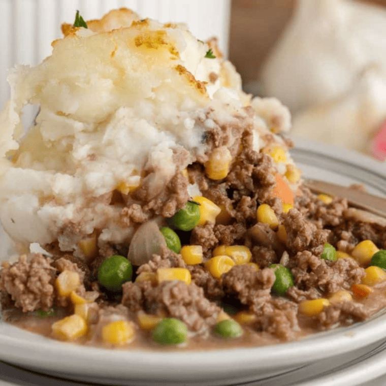 Air fryer shepherd’s pie garnished with fresh parsley and ready to serve