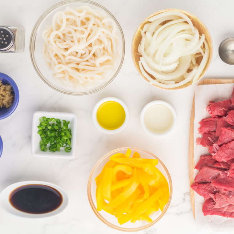 Ingredients for Blackstone Steak Udon laid out on a counter